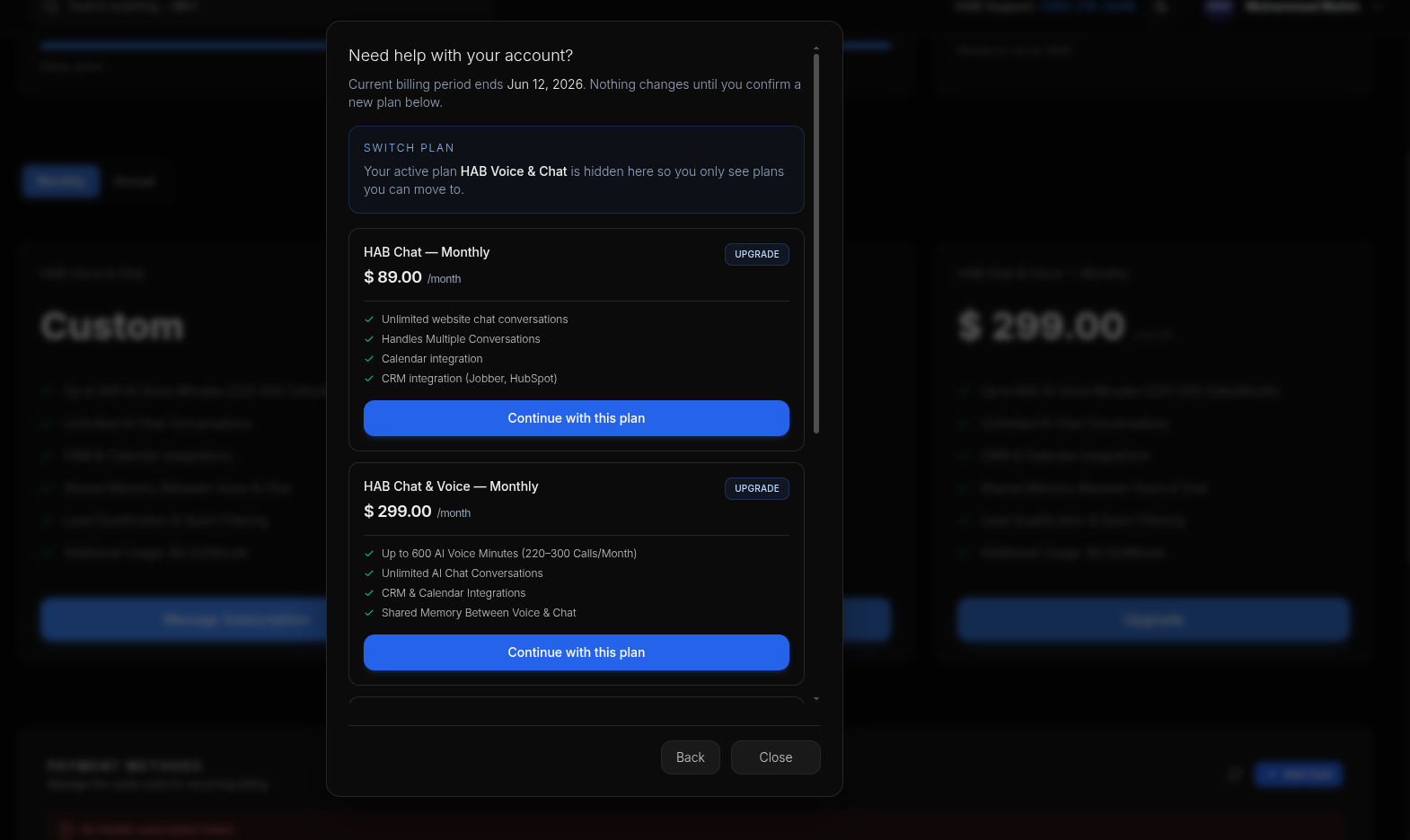 Plan cards with Upgrade and Manage Subscription buttons, and the switch-plan confirmation modal.